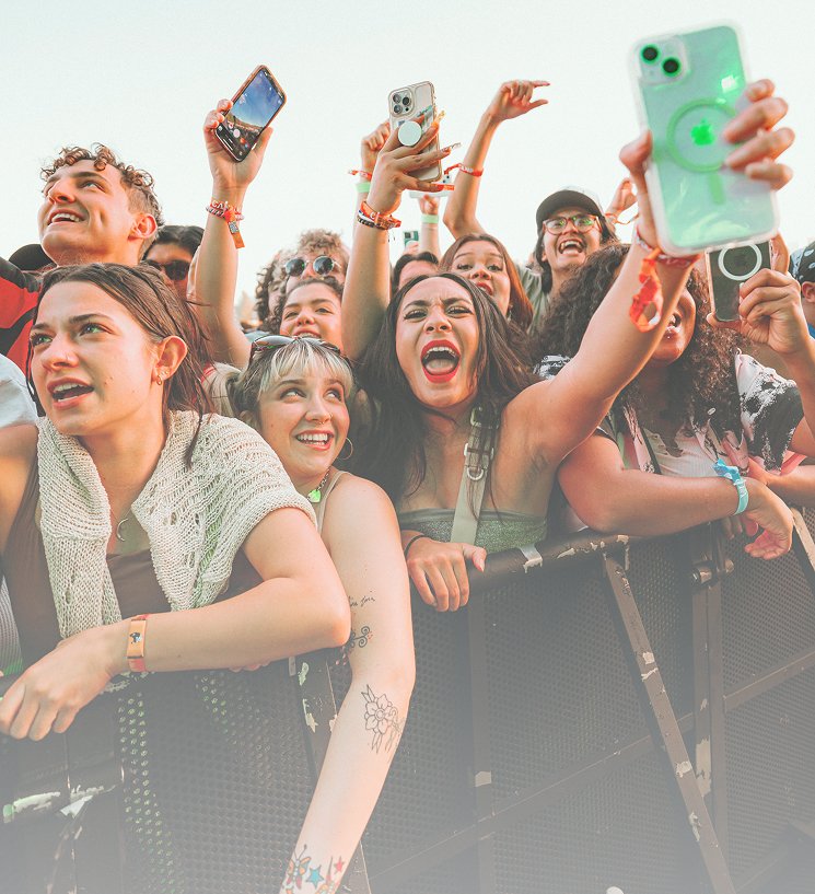 Festival-goers in sunglasses.